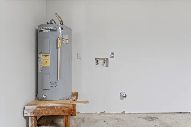 a view of bathroom with a table and chair