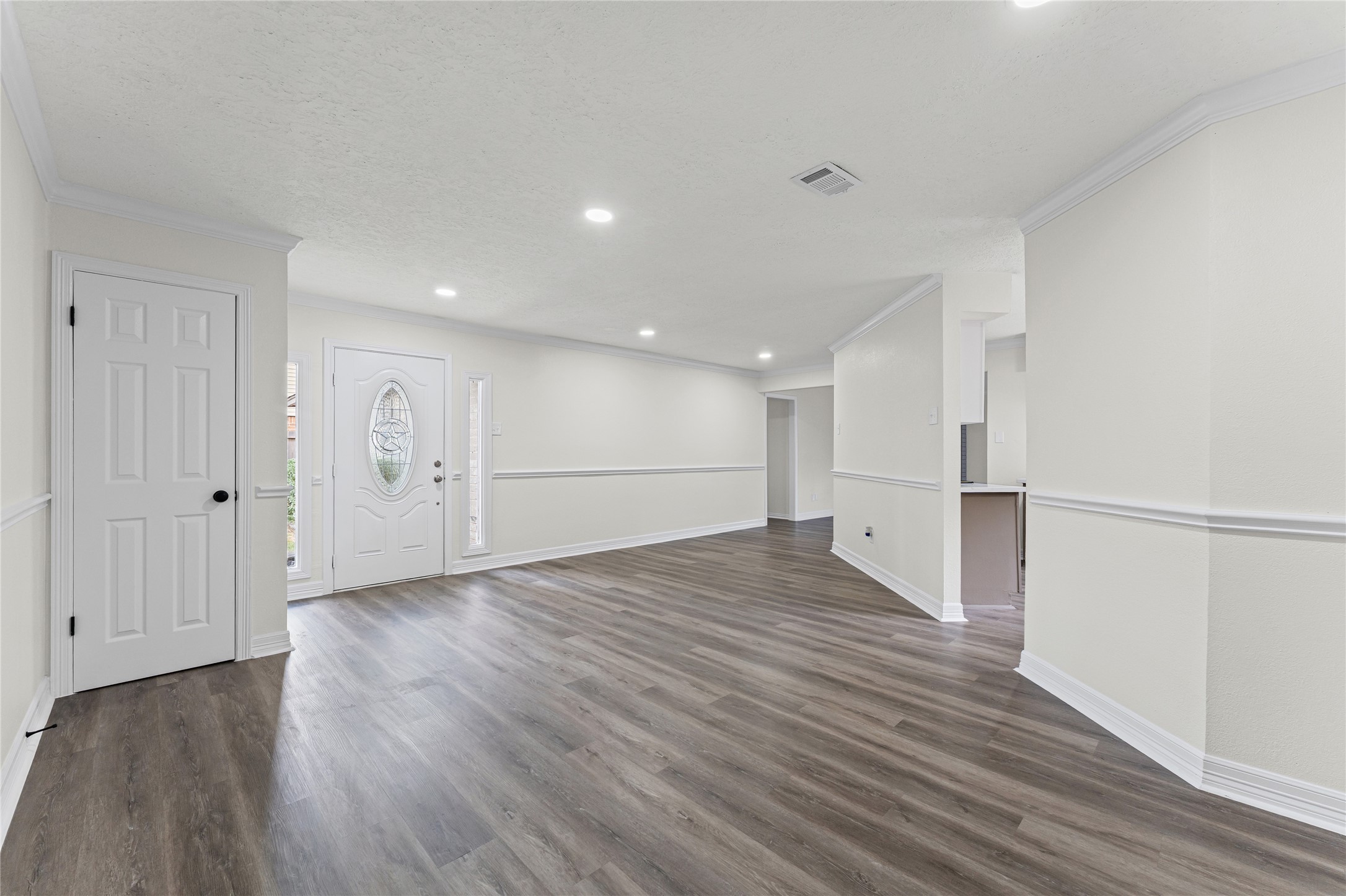 1506 Leadenhall Circle Channelview, TX 77530 - Photo 6 of 34 a view of empty room with wooden floor