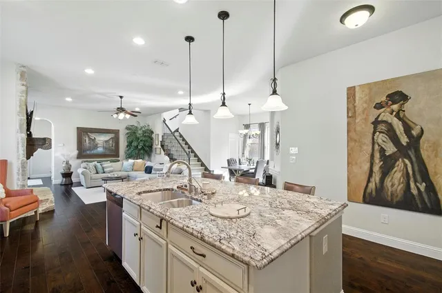 a view of a kitchen island furniture and a wooden floor