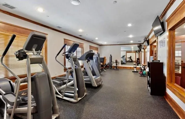 a view of a room with gym equipment