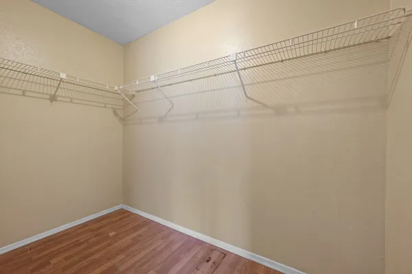 a view of a room with racks on the wall