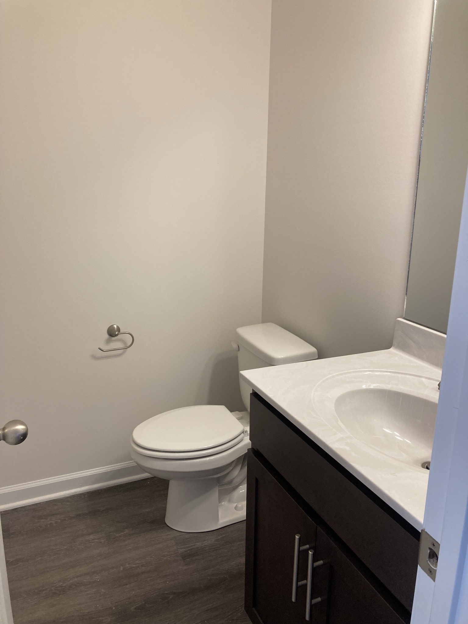 914 Peachers Mill Road, Unit A Clarksville, TN 37042 - Photo 12 of 30 a bathroom with a sink a toilet and vanity