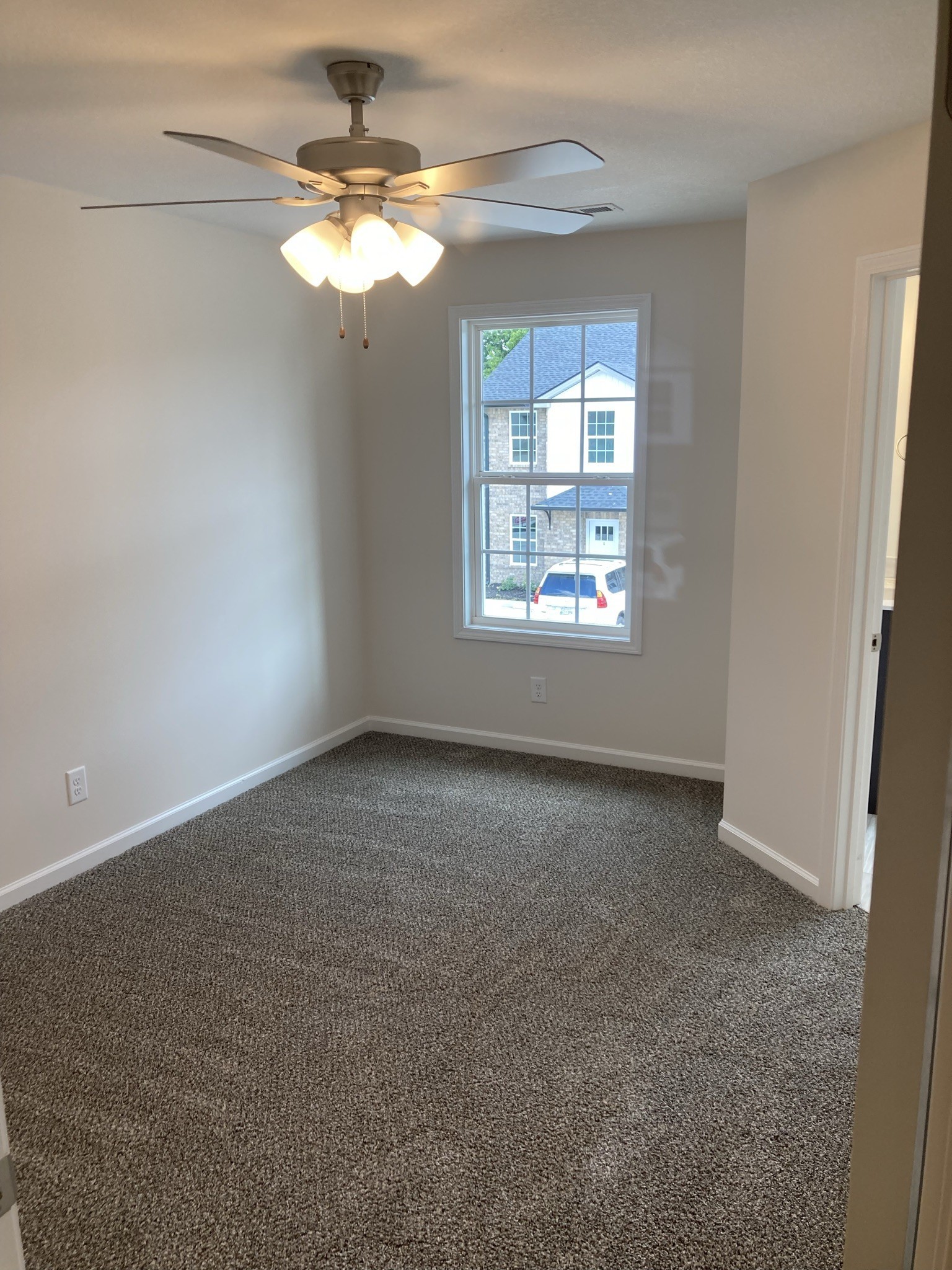 914 Peachers Mill Road, Unit A Clarksville, TN 37042 - Photo 15 of 30 an empty room with a window