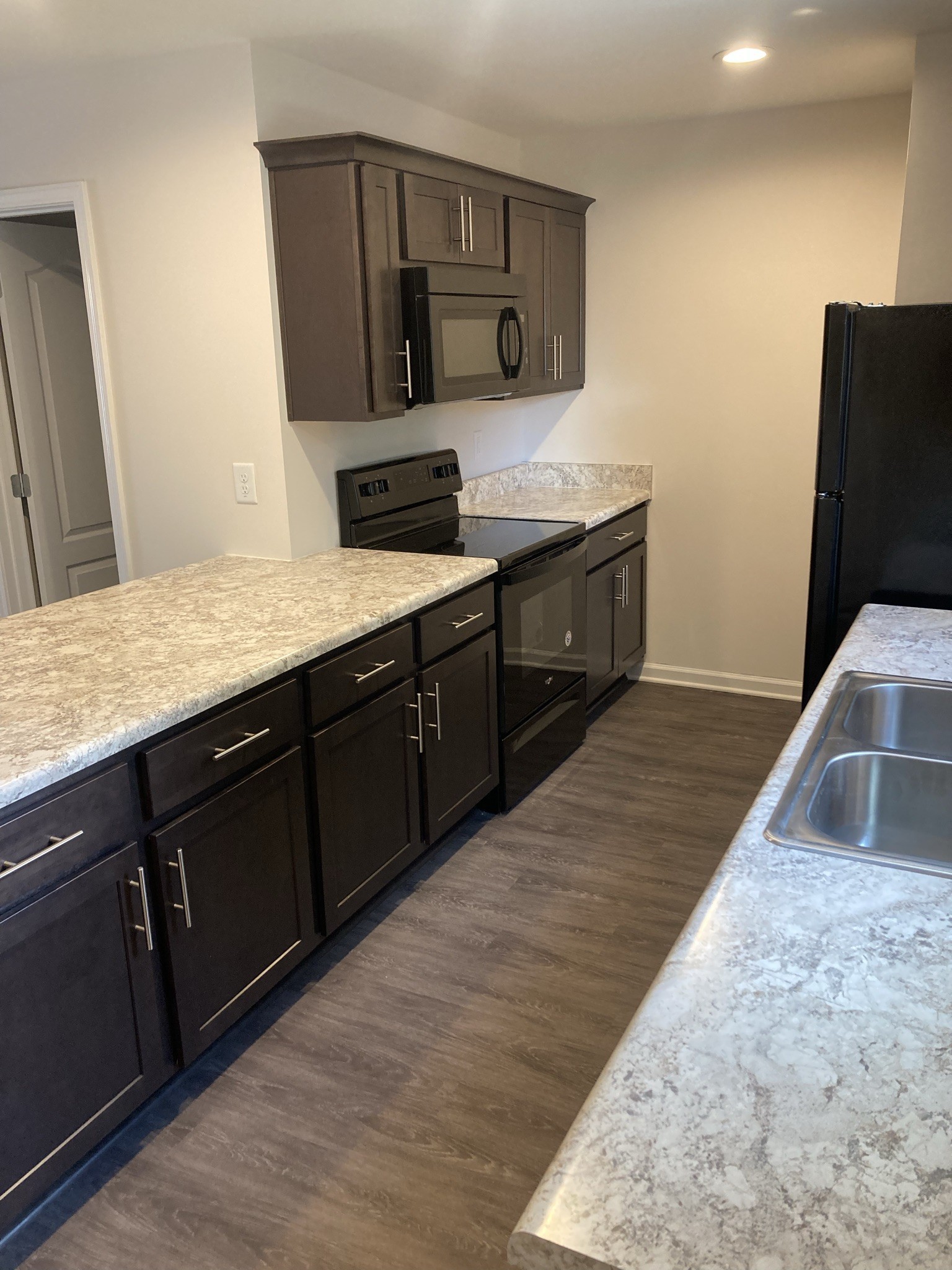 914 Peachers Mill Road, Unit A Clarksville, TN 37042 - Photo 9 of 30 a spacious bathroom with a granite countertop sink a mirror and shower