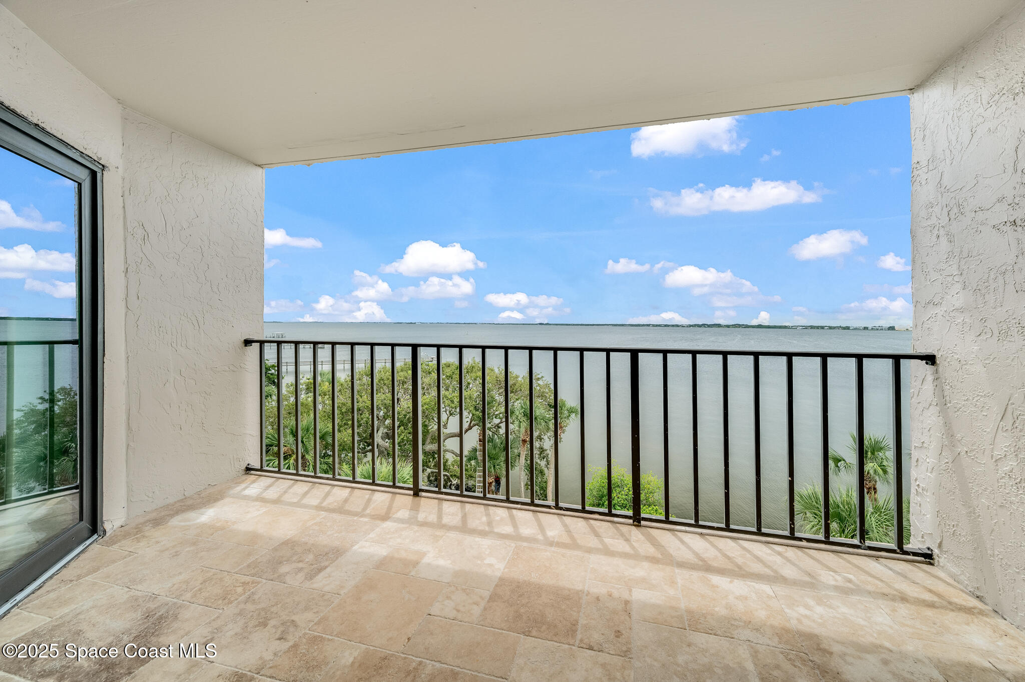 3220 River Villa Way, Unit 141 Melbourne Beach, FL 32951 - Photo 23 of 79 a view of a large window with an outdoor space