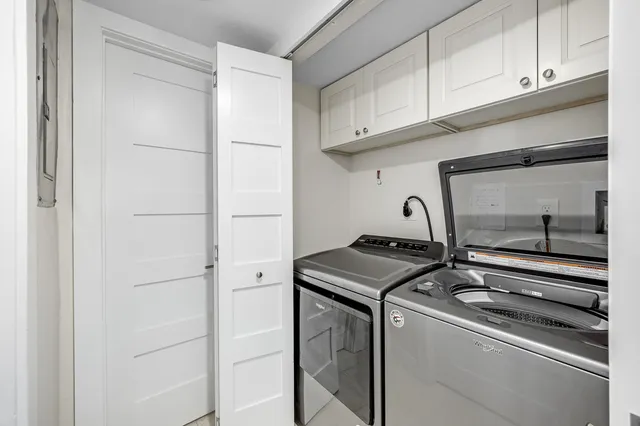 a view of a swimming pool with a chair