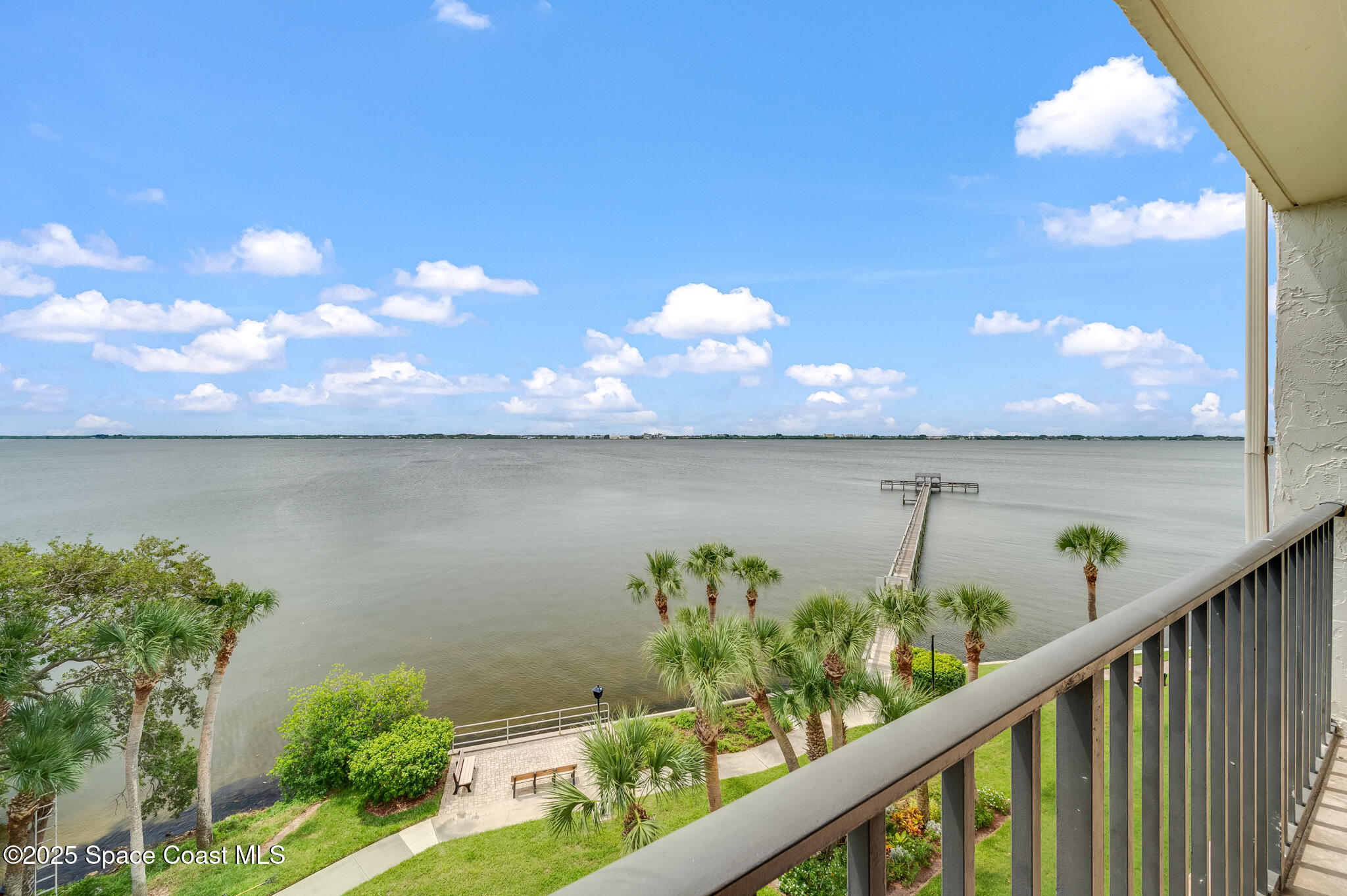 3220 River Villa Way, Unit 141 Melbourne Beach, FL 32951 - Photo 27 of 79 a view of a lake from a balcony