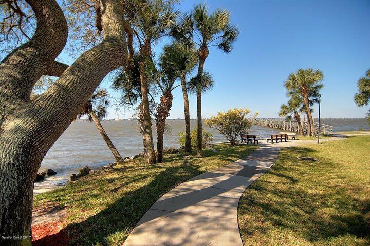 3220 River Villa Way, Unit 141 Melbourne Beach, FL 32951 - Photo 29 of 79 a view of a yard with an outdoor space