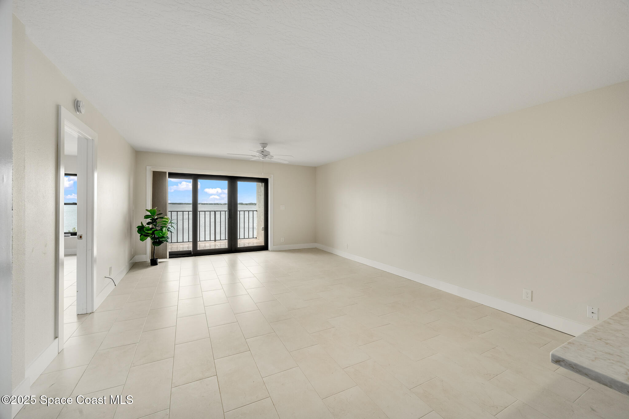 3220 River Villa Way, Unit 141 Melbourne Beach, FL 32951 - Photo 3 of 79 a view of an empty room with window