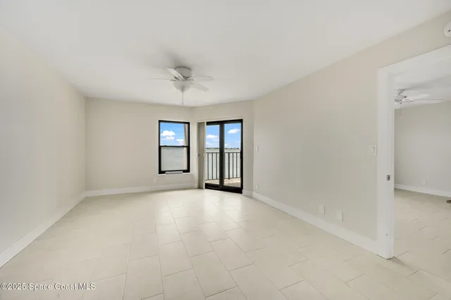 an aerial view of a house with outdoor space and lake view