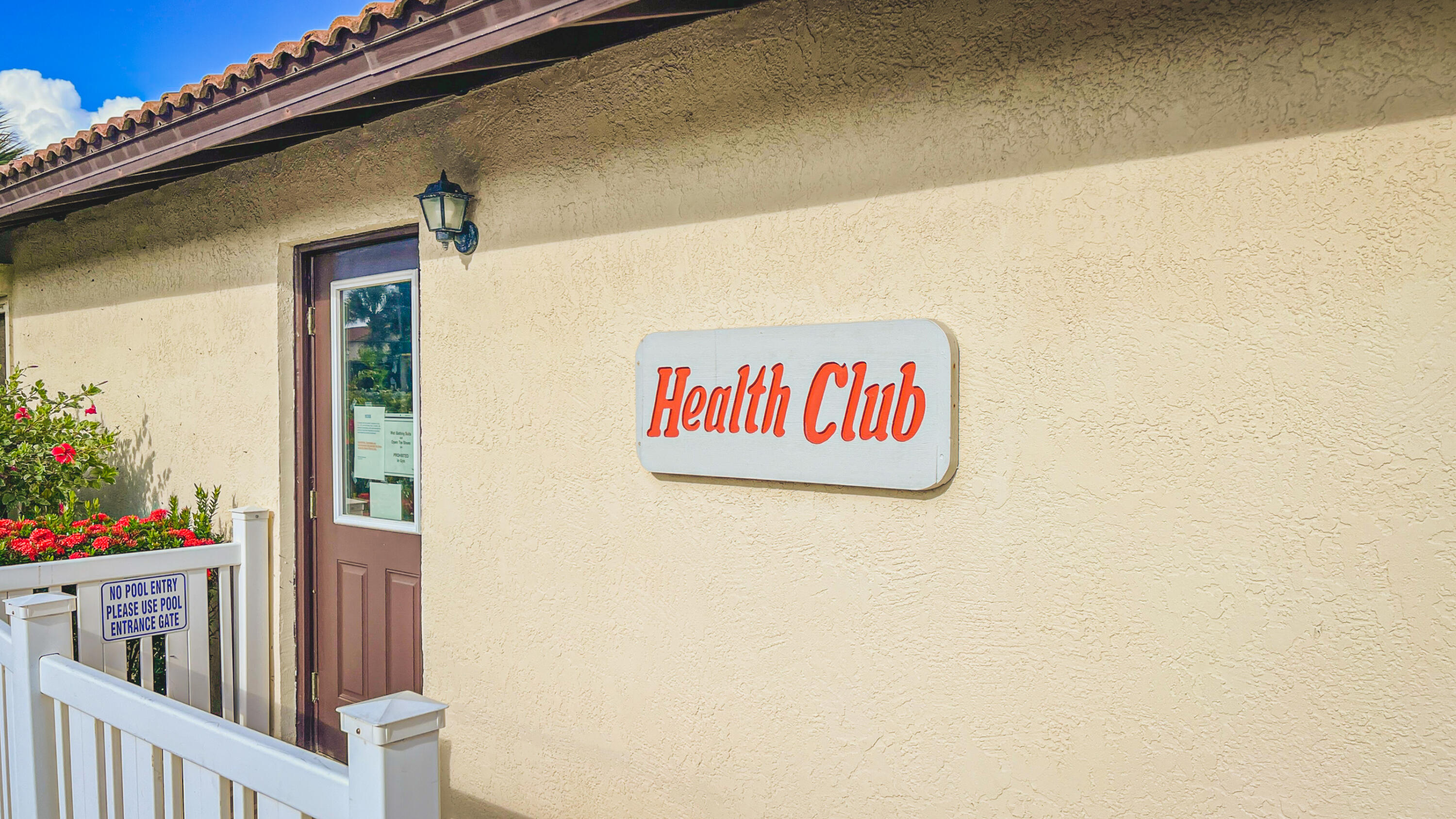 3220 River Villa Way, Unit 141 Melbourne Beach, FL 32951 - Photo 42 of 79 a signage on a wall next to a white wall