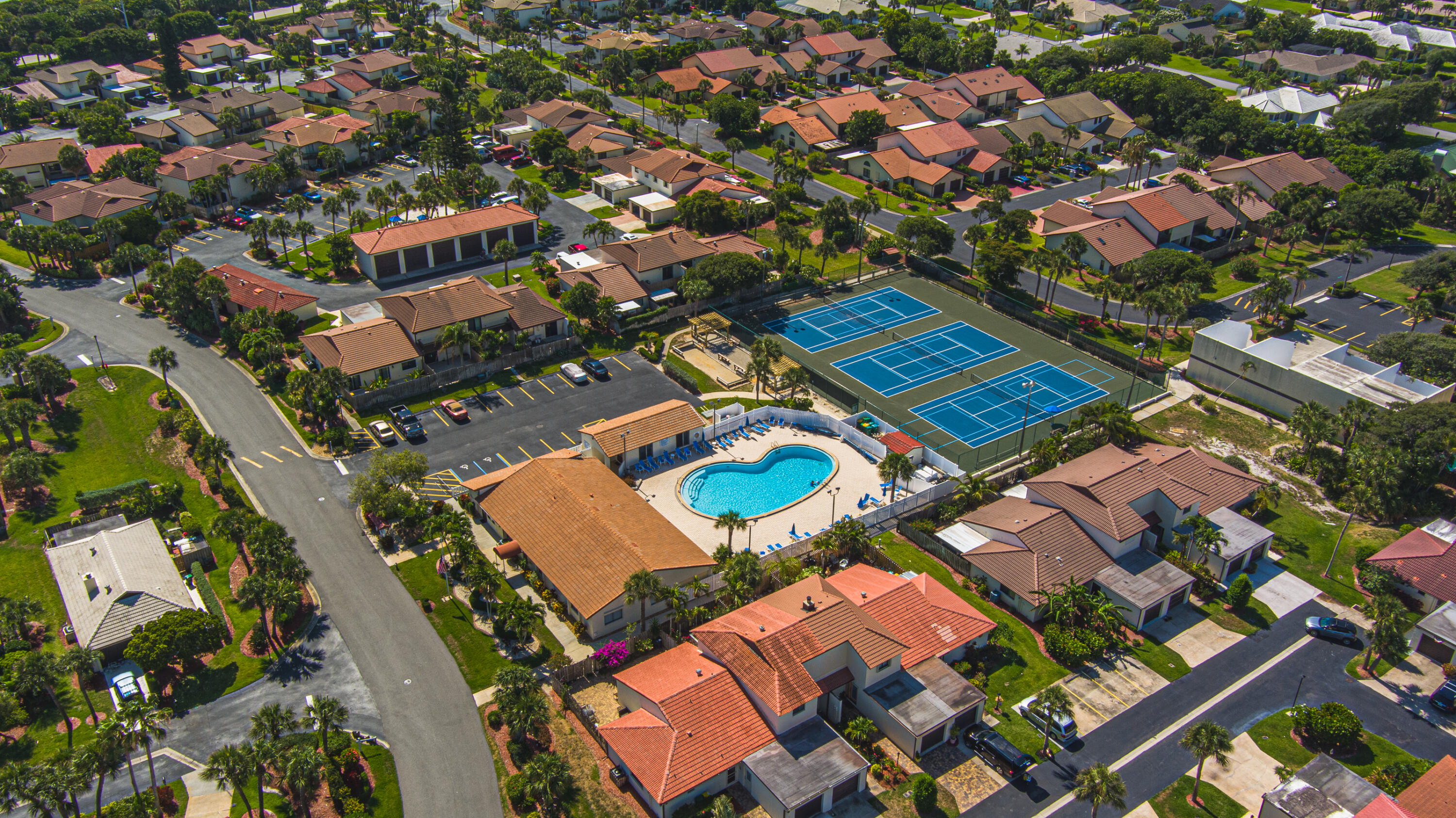 3220 River Villa Way, Unit 141 Melbourne Beach, FL 32951 - Photo 43 of 79 an aerial view of residential houses with outdoor space