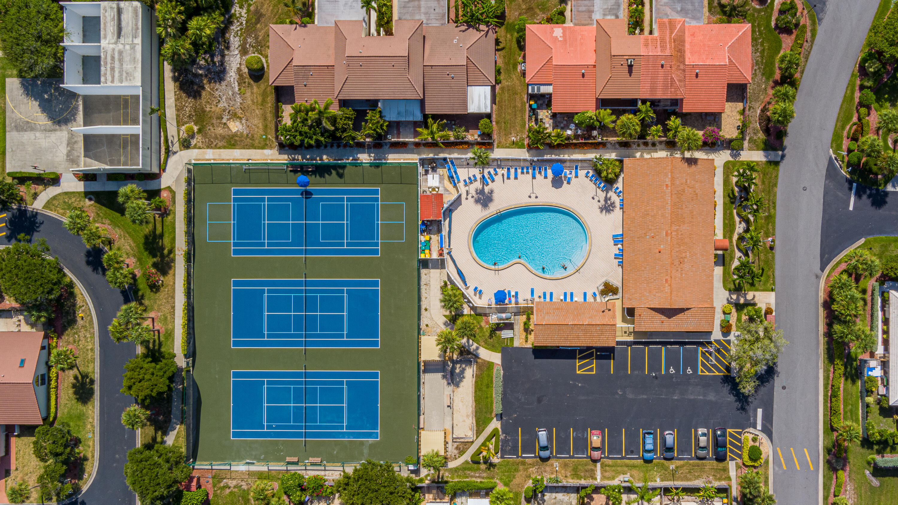 3220 River Villa Way, Unit 141 Melbourne Beach, FL 32951 - Photo 46 of 79 an aerial view of residential houses with outdoor space