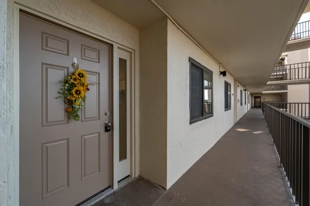 an aerial view of house with yard swimming pool and outdoor seating