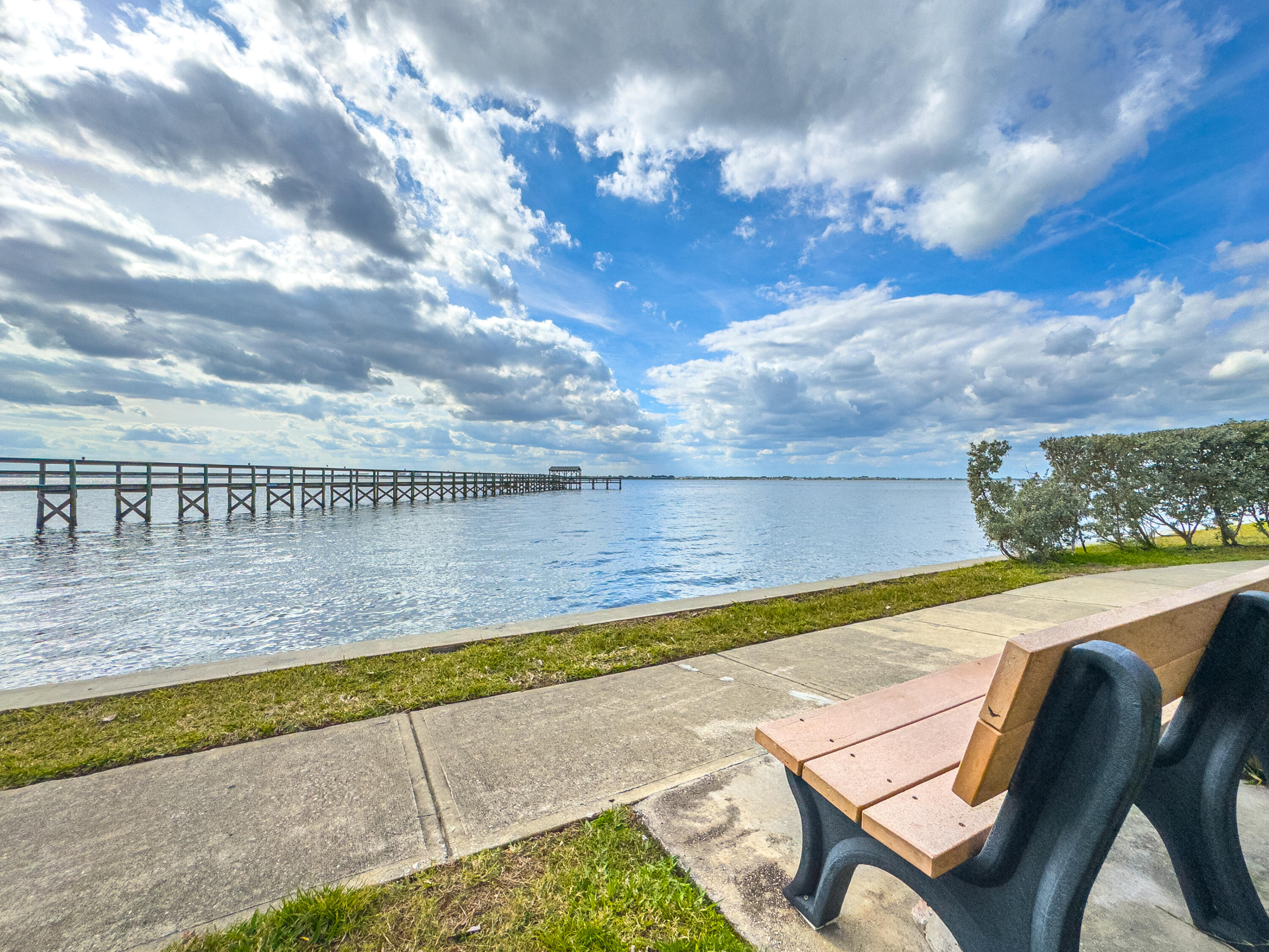 3220 River Villa Way, Unit 141 Melbourne Beach, FL 32951 - Photo 56 of 79 a view of a swimming pool with an outdoor seating