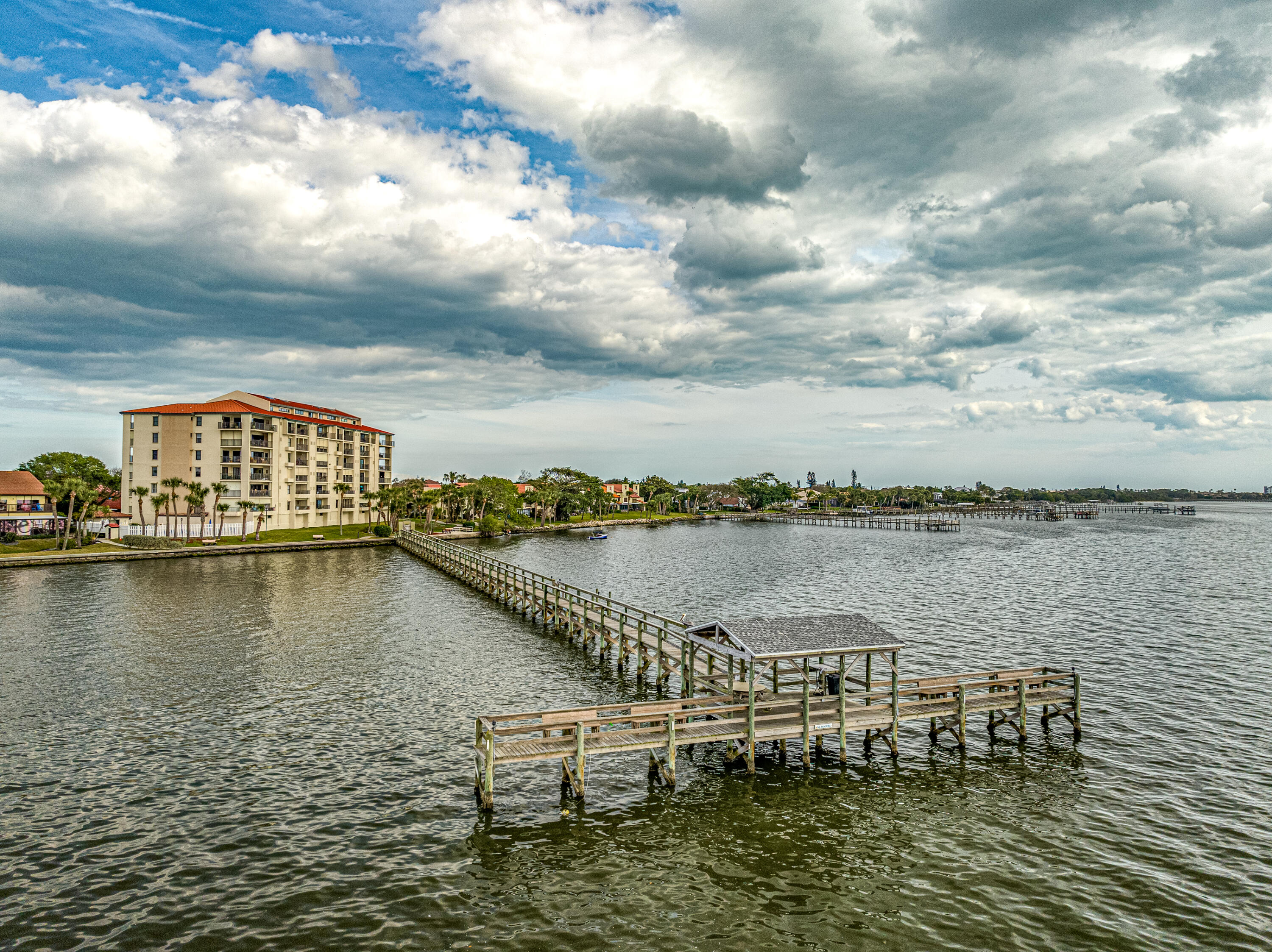 3220 River Villa Way, Unit 141 Melbourne Beach, FL 32951 - Photo 65 of 79 a view of a lake with a mountain view