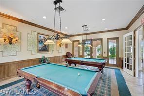 1840 Florida Club Circle, Unit 5206 Naples, FL 34112 - Photo 12 of 13 a room with pool table and windows