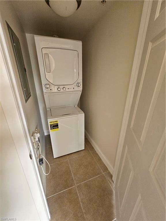 1840 Florida Club Circle, Unit 5206 Naples, FL 34112 - Photo 5 of 13 a utility room with dryer and washer