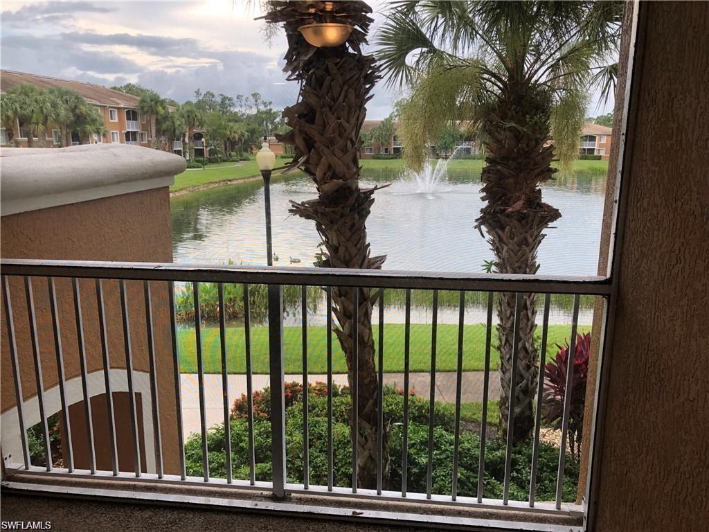 1840 Florida Club Circle, Unit 5206 Naples, FL 34112 - Photo 8 of 13 a view of a small yard from a balcony