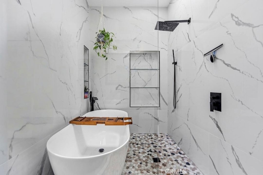 5055 North Raton Circle Long Beach, CA 90807 - Photo 24 of 42 a bathroom with a sink a toilet and shower