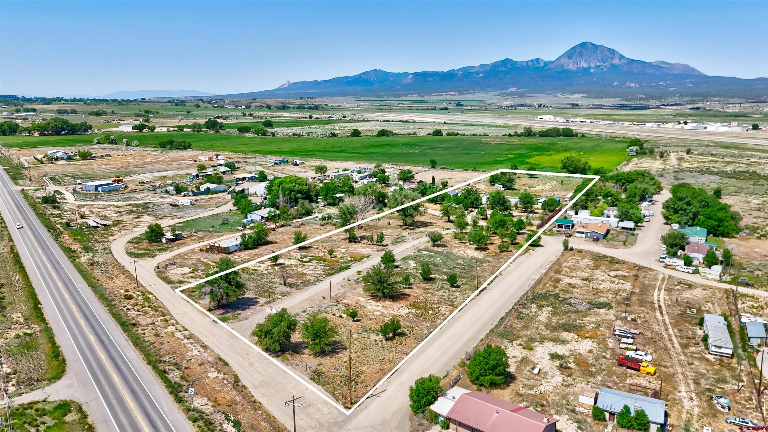 6493 Road 23.6 Cortez, CO 81321 - Photo 1 of 44 a view of a city with an ocean