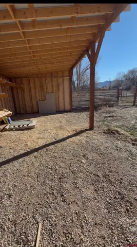 a view of a yard with an outdoor space