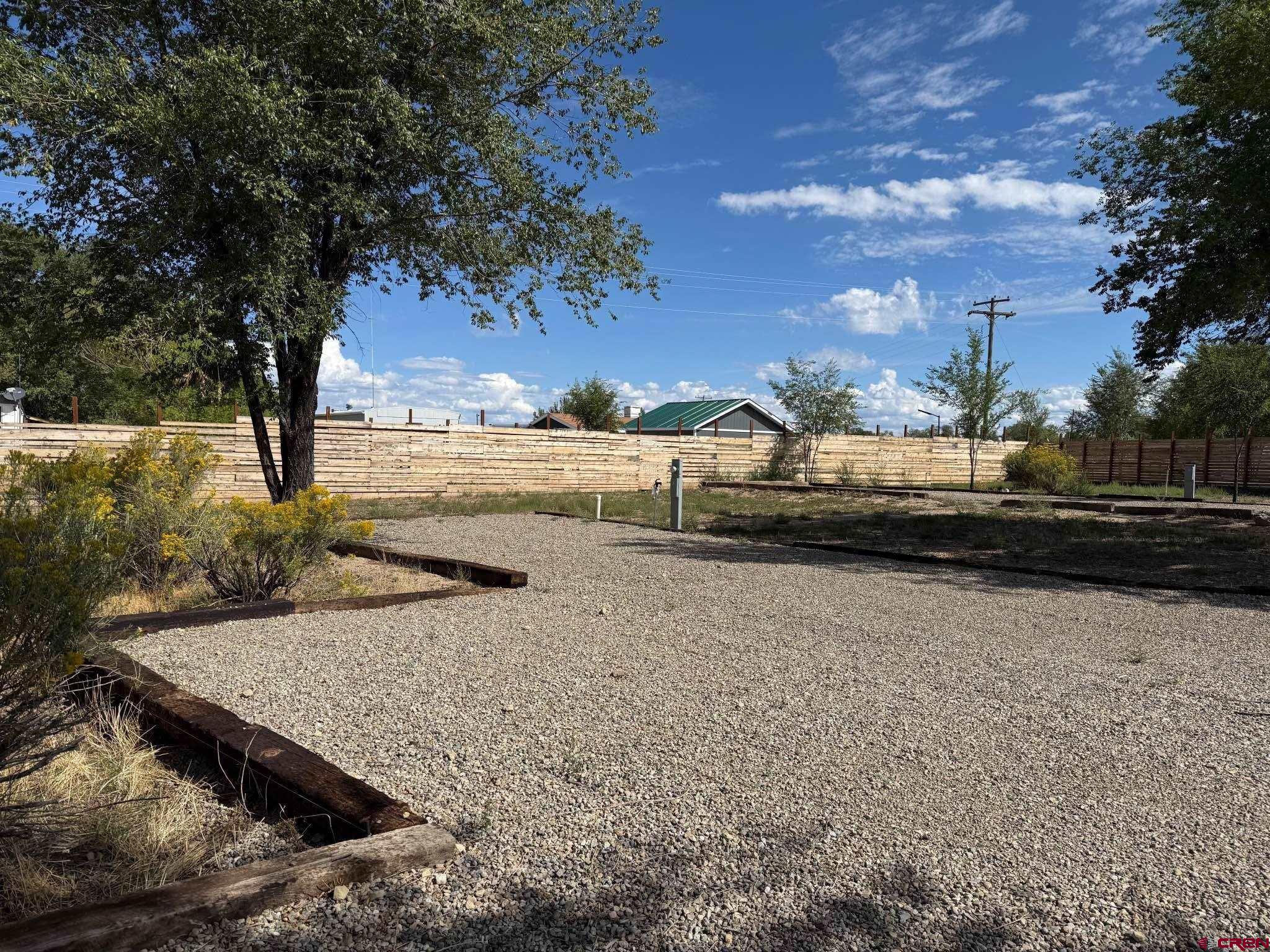 6493 Road 23.6 Cortez, CO 81321 - Photo 38 of 44 a view of a yard with an outdoor space