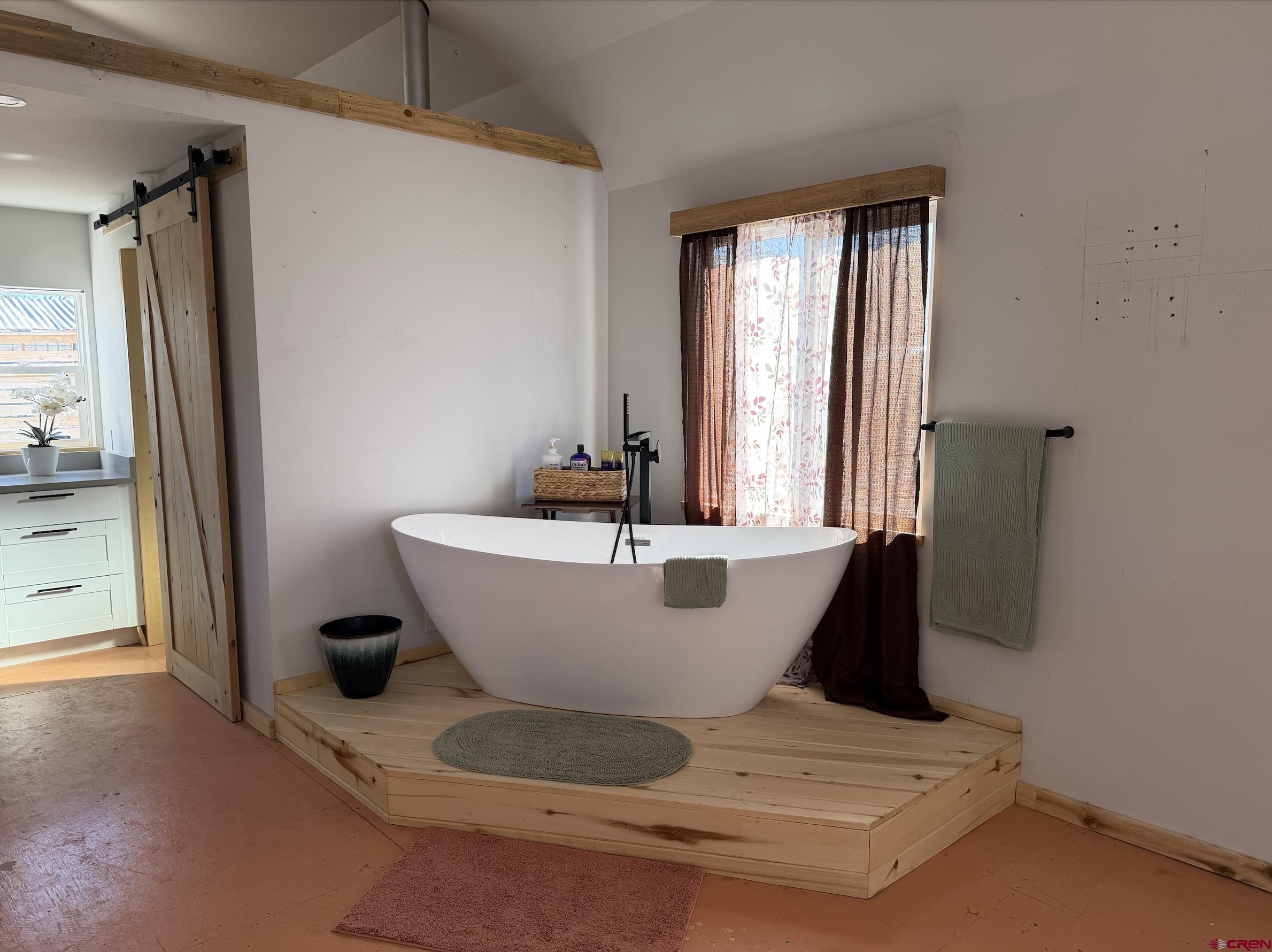 6493 Road 23.6 Cortez, CO 81321 - Photo 44 of 44 a view of a bathtub in kitchen and bathroom