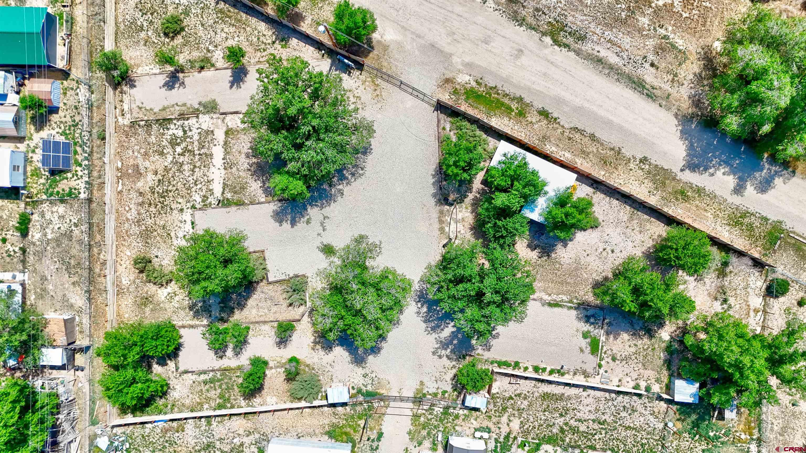 6493 Road 23.6 Cortez, CO 81321 - Photo 9 of 44 an aerial view of house with yard