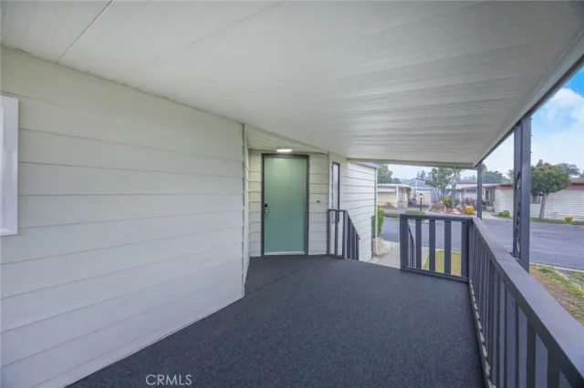 a view of hallway with seating area