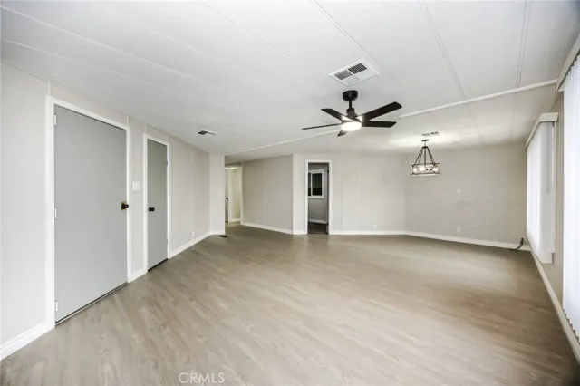 a view of a livingroom with a ceiling fan