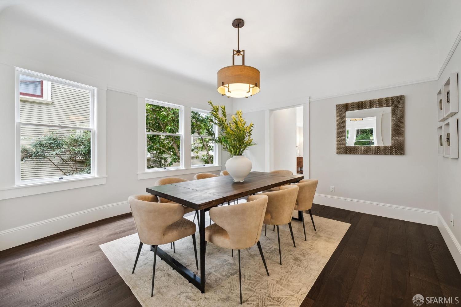 2518 Etna Street Berkeley, CA 94704 - Photo 12 of 99 a view of a dining room with furniture window and wooden floor