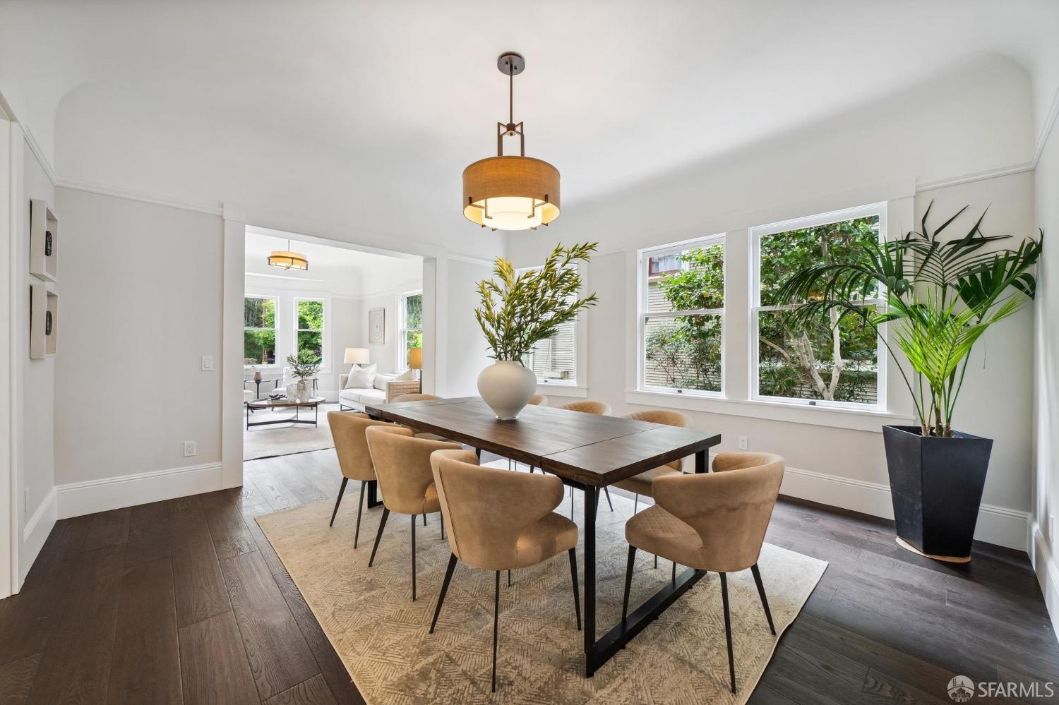 2518 Etna Street Berkeley, CA 94704 - Photo 13 of 99 a view of a dining room with furniture window and wooden floor