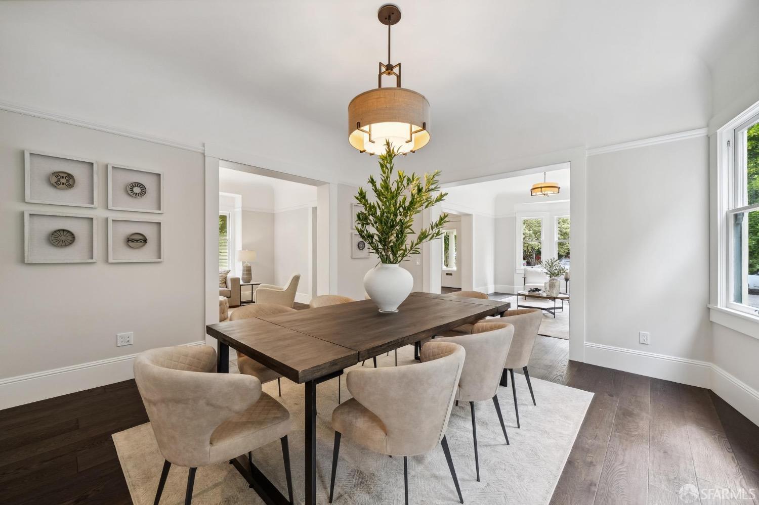 2518 Etna Street Berkeley, CA 94704 - Photo 14 of 99 a view of a dining room with furniture and wooden floor