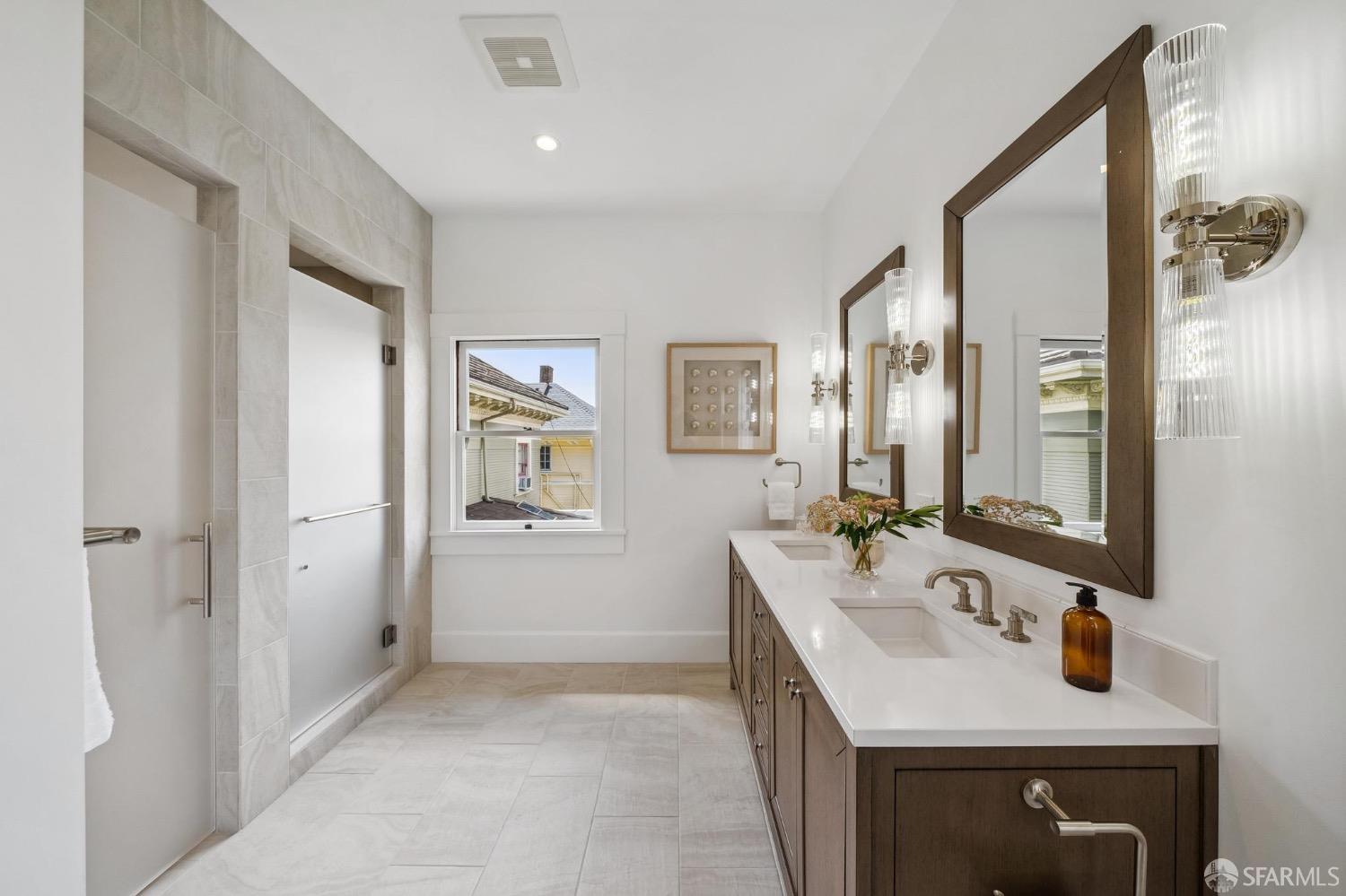 2518 Etna Street Berkeley, CA 94704 - Photo 41 of 99 a bathroom with a sink and a mirror