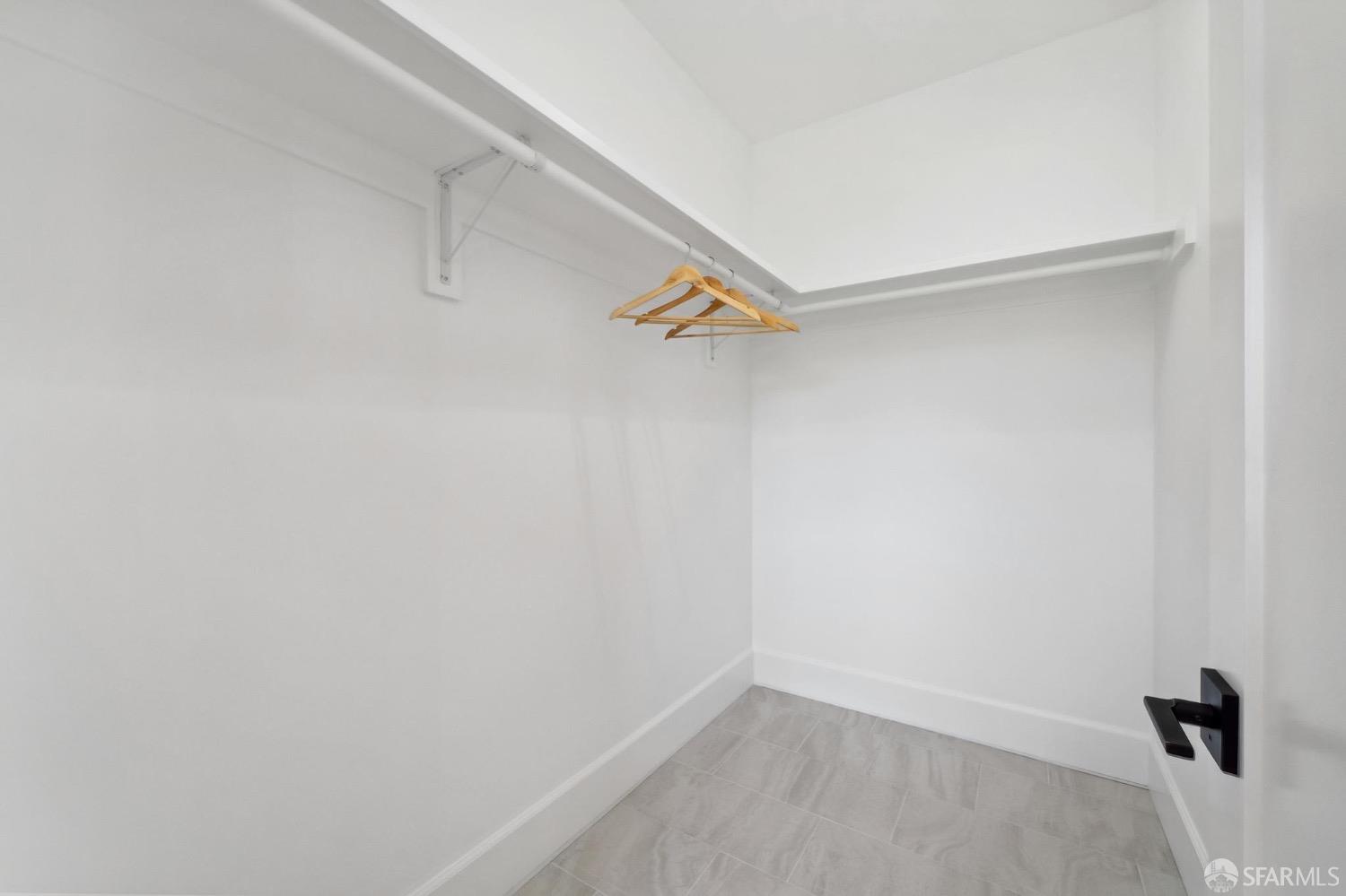 2518 Etna Street Berkeley, CA 94704 - Photo 46 of 99 a view of a room with racks on the wall