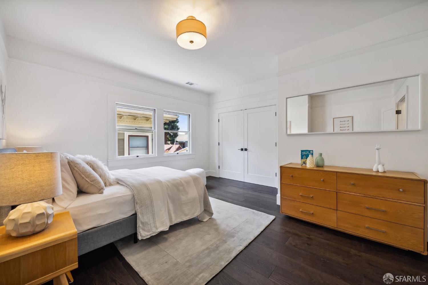 2518 Etna Street Berkeley, CA 94704 - Photo 48 of 99 a bed room with a bed and a couch