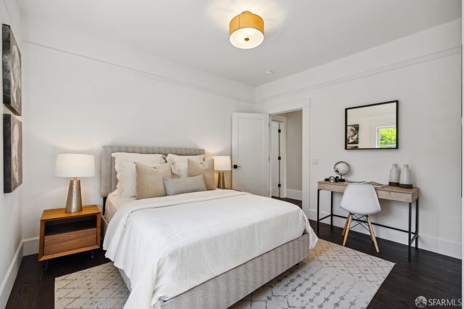 2518 Etna Street Berkeley, CA 94704 - Photo 58 of 99 a bedroom with a bed and painting on the wall