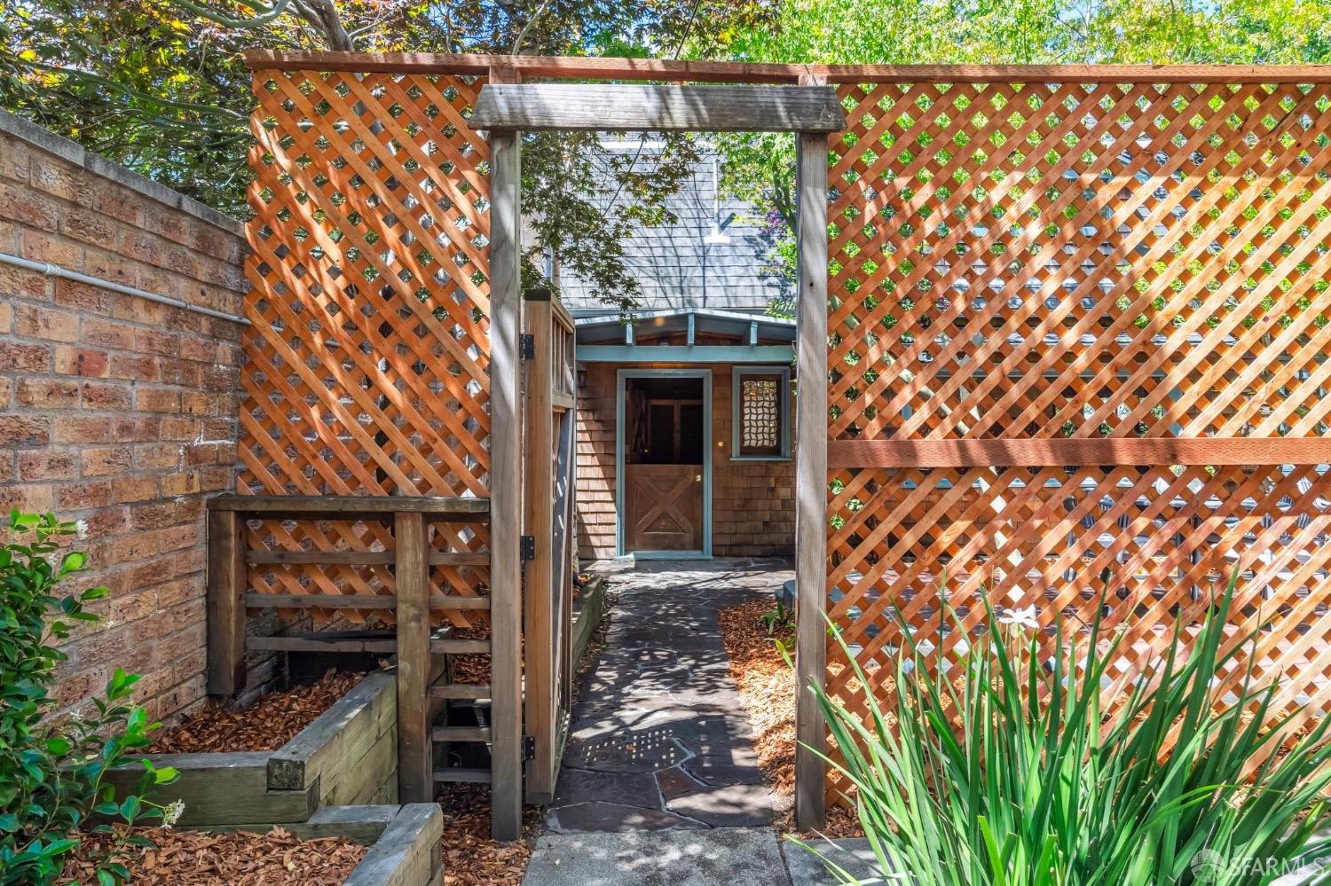 2518 Etna Street Berkeley, CA 94704 - Photo 65 of 99 a front view of a house with a large window and plants