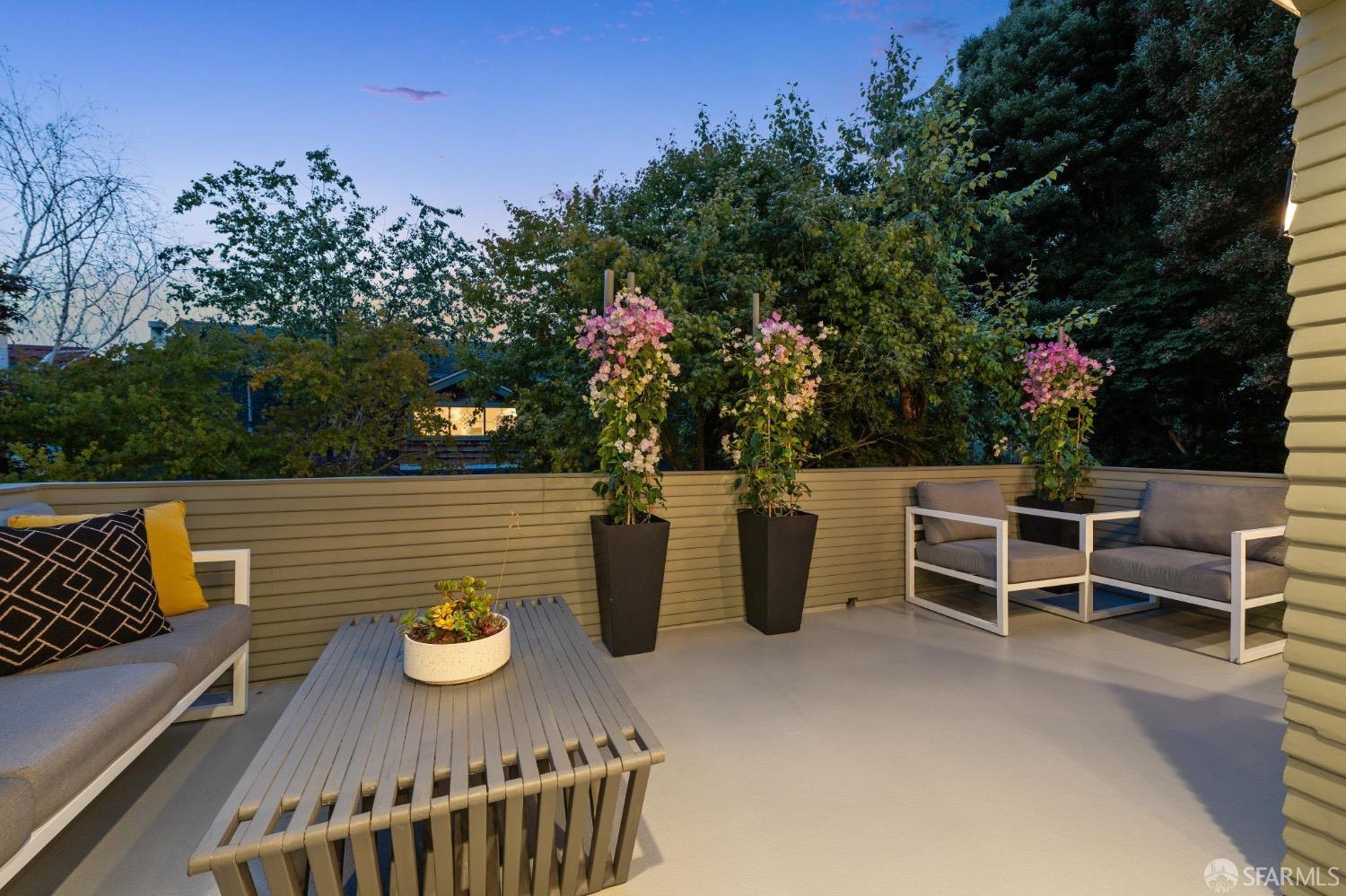 2518 Etna Street Berkeley, CA 94704 - Photo 87 of 99 a view of a patio with table and chairs and potted plants