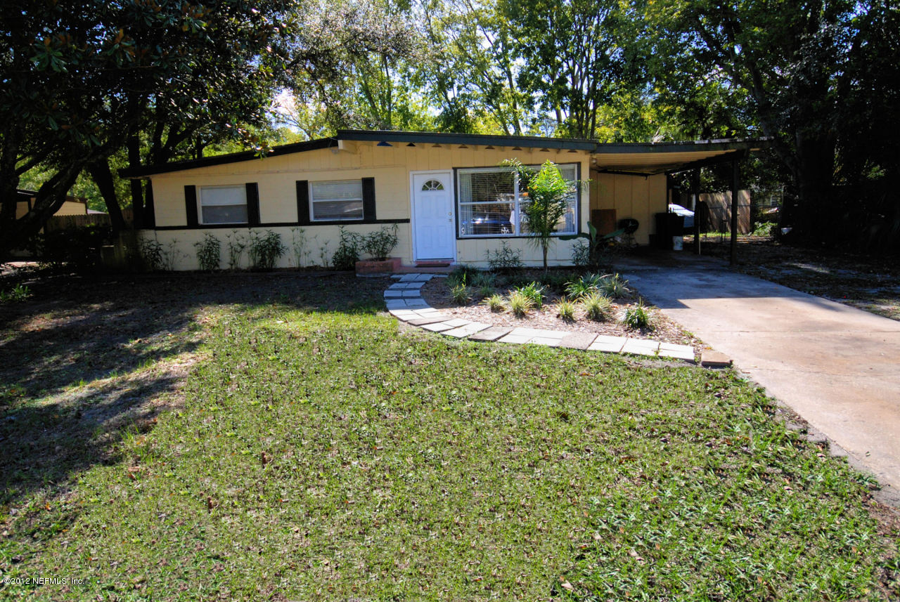10460 Ebbitt Road Jacksonville, FL 32246 - Photo 1 of 11 front of house