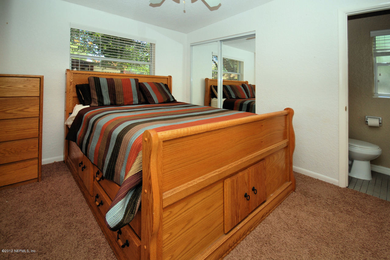 10460 Ebbitt Road Jacksonville, FL 32246 - Photo 3 of 11 master bedroom 1/2 bath