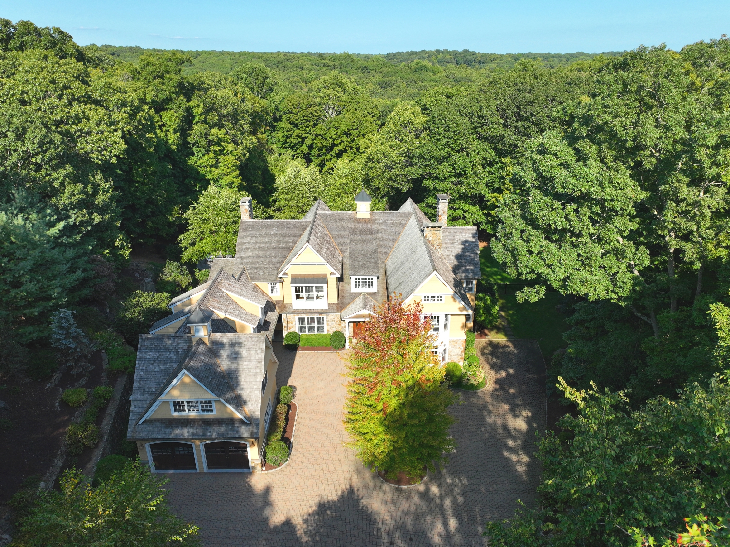 230 Nod Hill Road Wilton, CT 06897 - Photo 1 of 1 Fall in love with 230 Nod Hill Road, a magnificent home surrounded by nature's tranquility, offering luxurious living spaces and exquisite design
