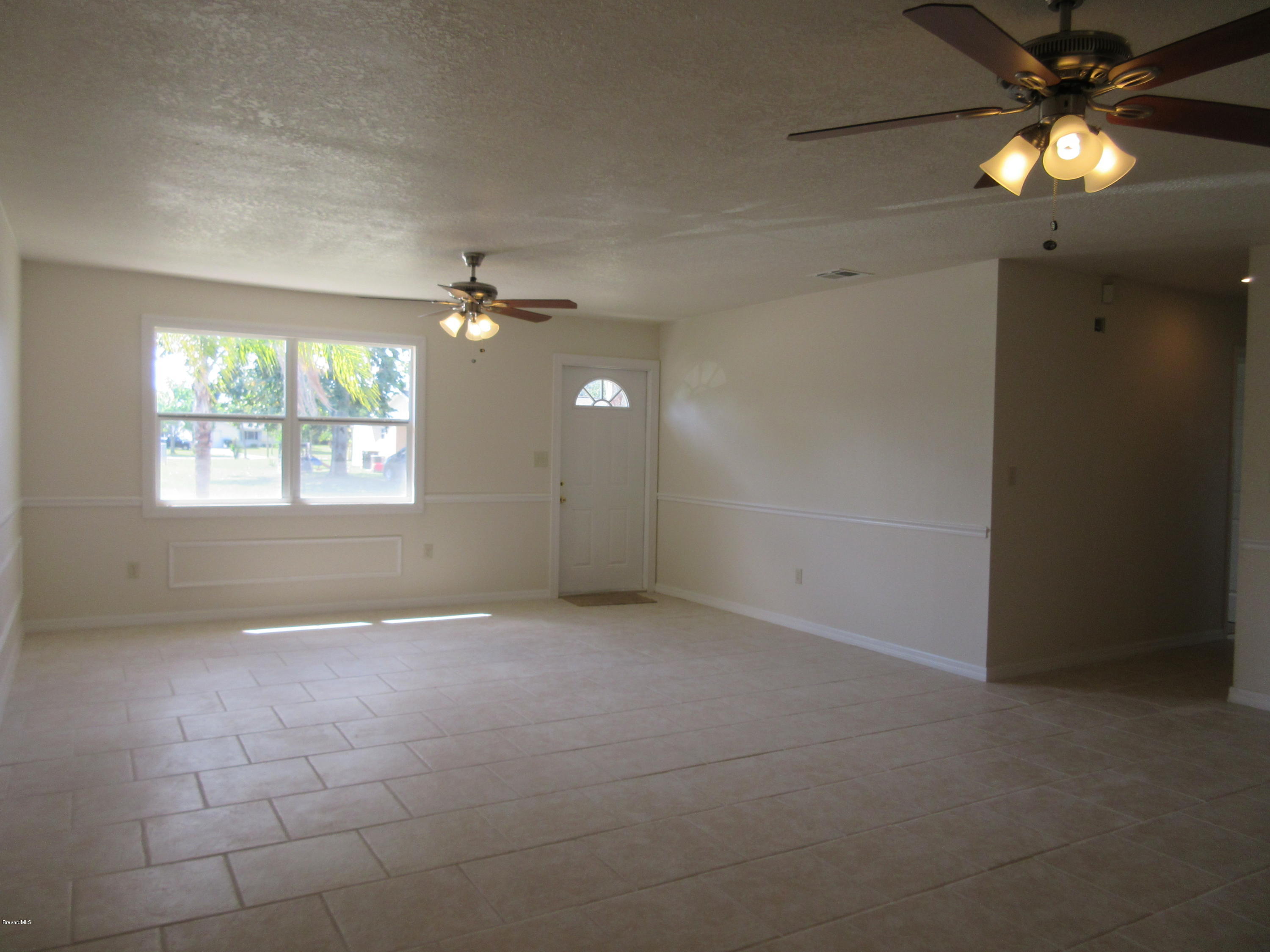 1260 Creel Road Northeast Palm Bay, FL 32905 - Photo 5 of 30 Living Room