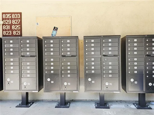 a view of a lobby with furniture and lamp