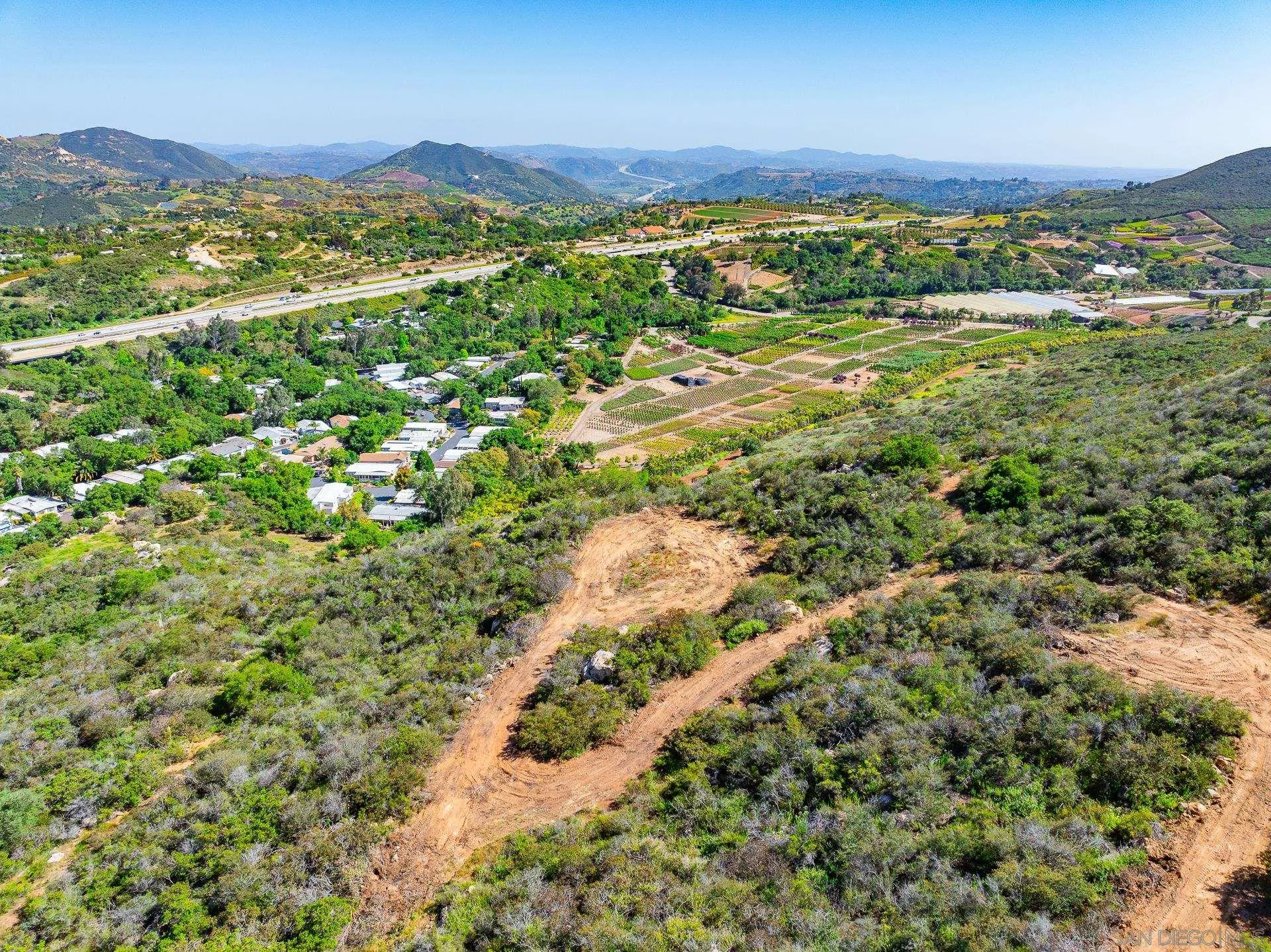 0 Rainbow Glen Fallbrook, CA 92028 - Photo 22 of 26 a view of a city with mountains in the background