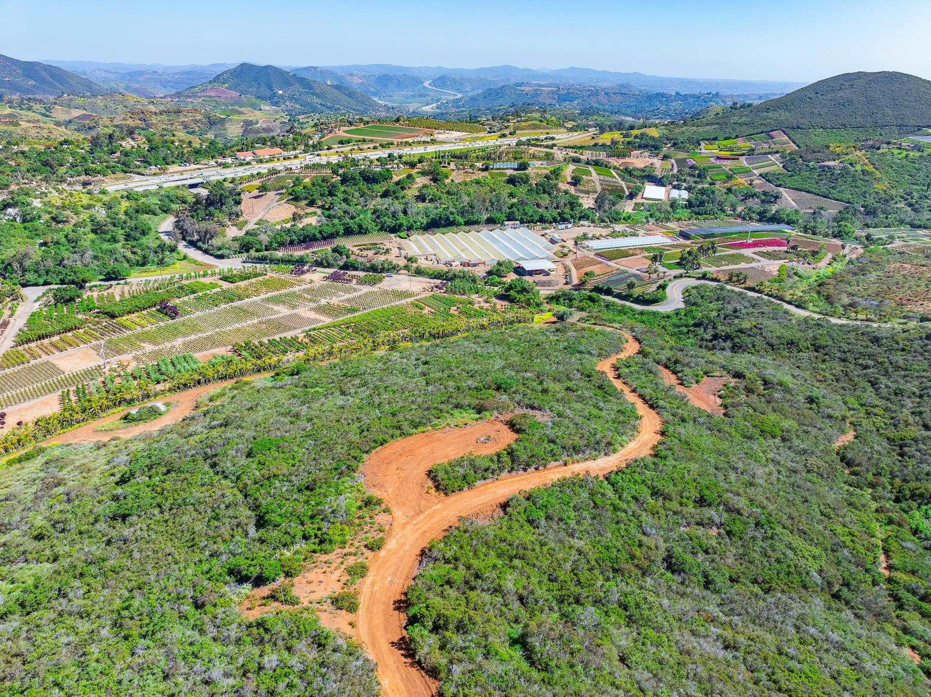 0 Rainbow Glen Fallbrook, CA 92028 - Photo 23 of 26 a view of a city with mountains in the background