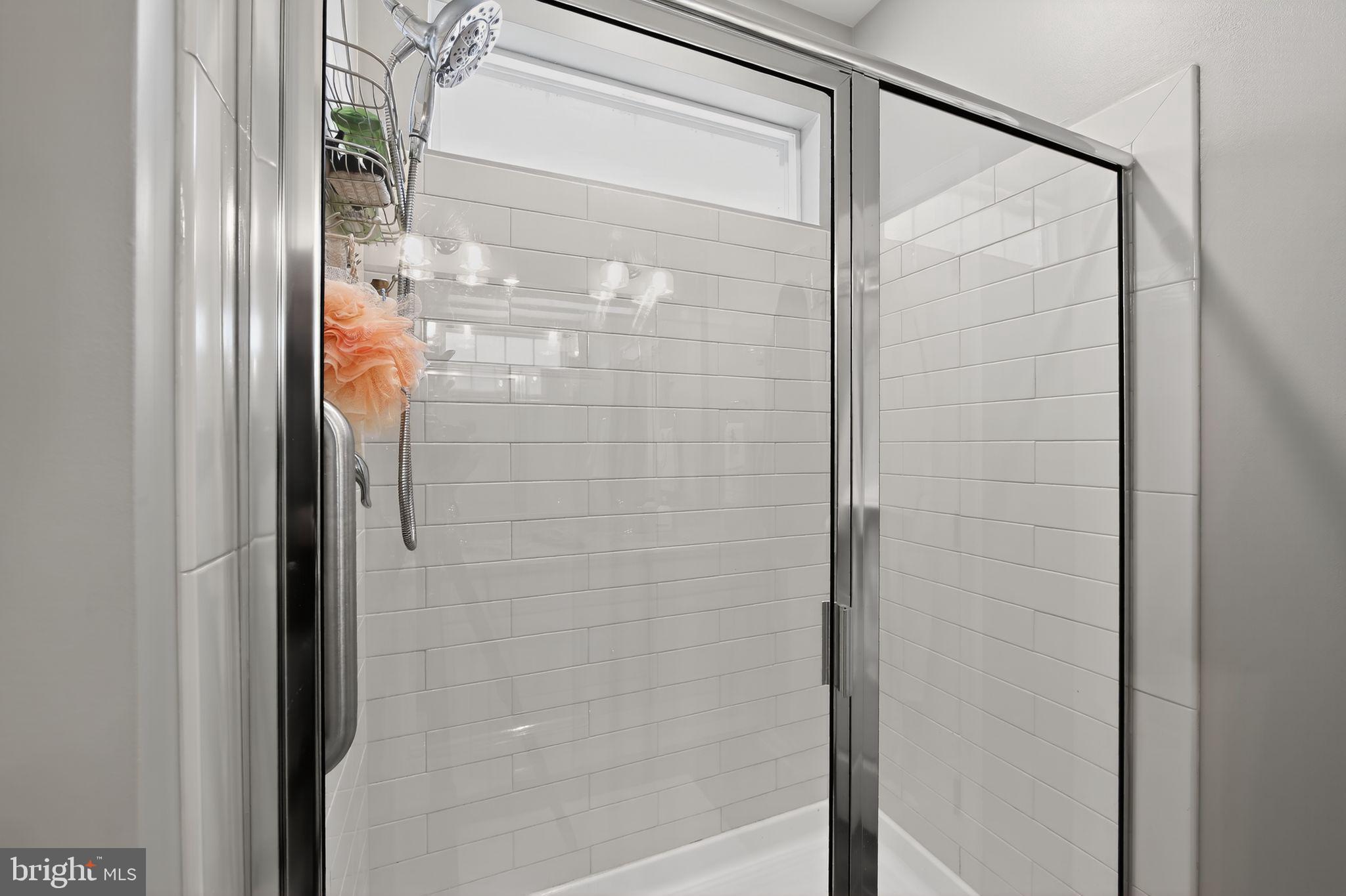 618 Kent Court Chester Springs, PA 19425 - Photo 19 of 34 a bathroom with a glass shower door