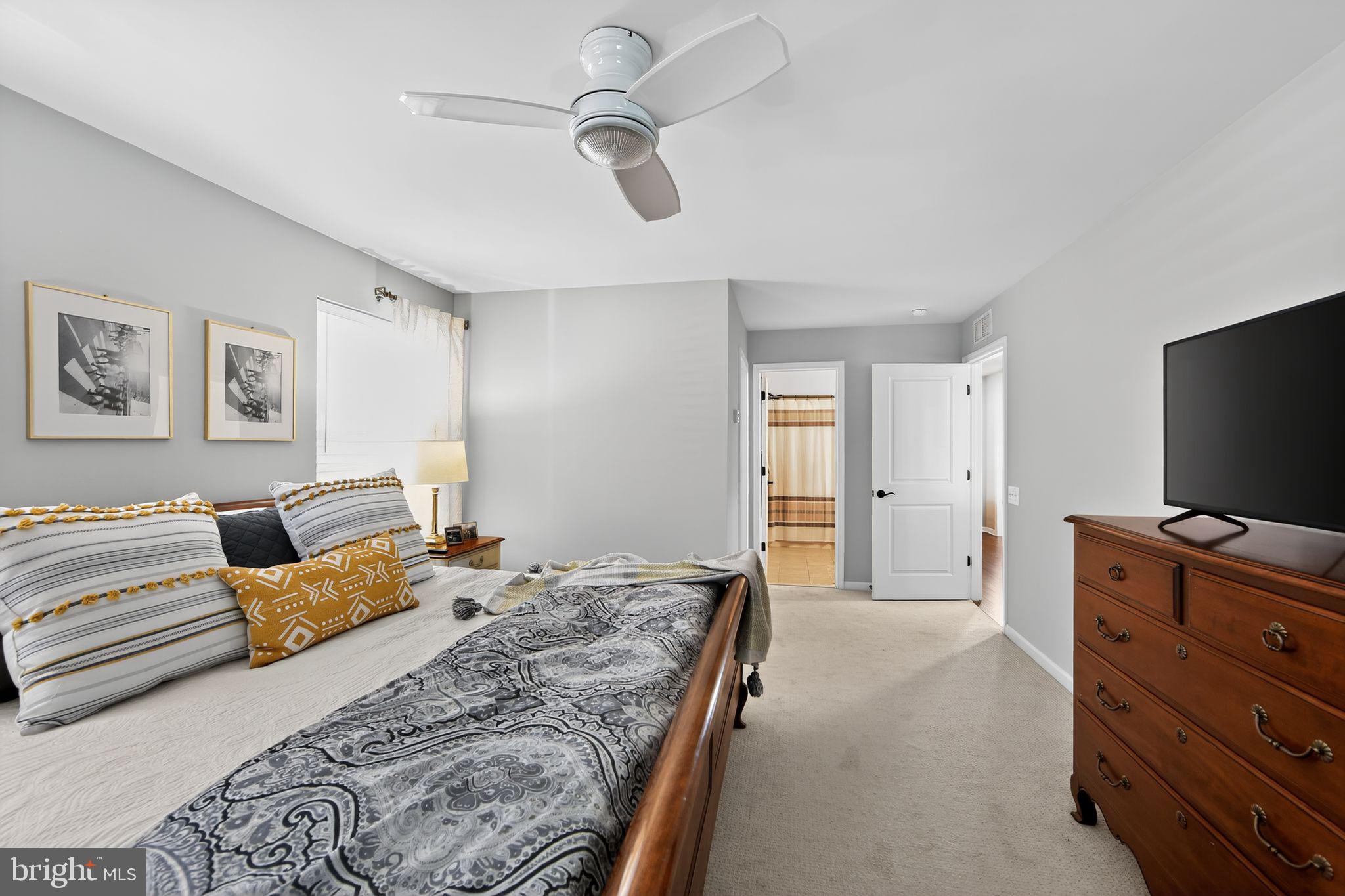 618 Kent Court Chester Springs, PA 19425 - Photo 22 of 34 a bedroom with a bed and a flat screen tv