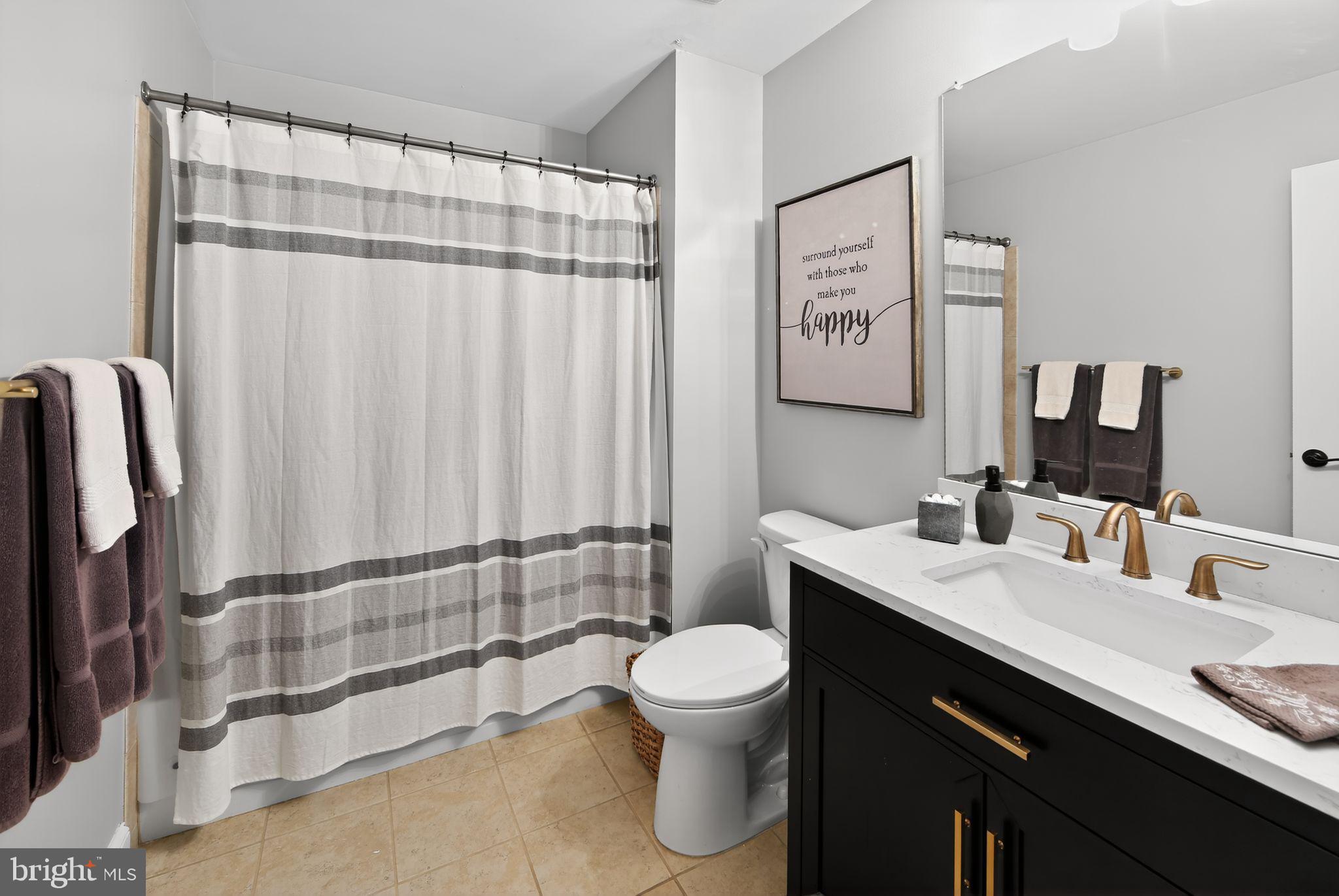 618 Kent Court Chester Springs, PA 19425 - Photo 23 of 34 a bathroom with a sink a toilet and shower